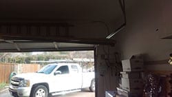 Action Garage Doors was assigned to evaluate and repair the broken steel garage door roller and repair at this residence in Dallas Texas