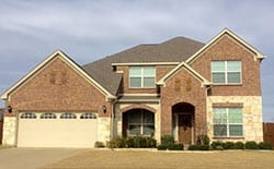 This is a beautiful residential two car steel garage door was installed and repaired in Frisco Texas by technicians from Action Garage Doors