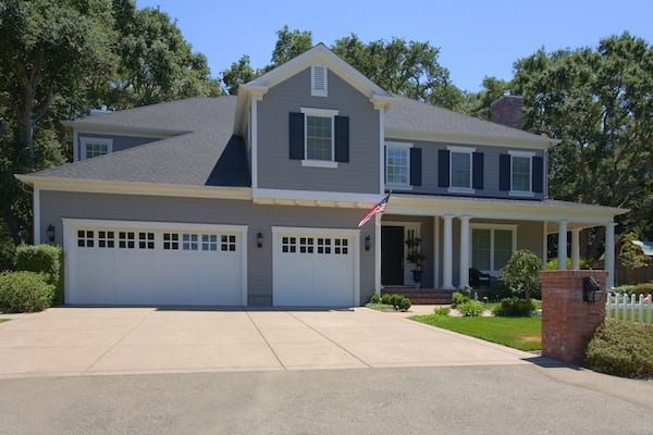 A home with two garage doors in The Woodlands, Tx