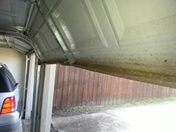 The highly experienced technicians from Action Garage Doors went to a home in Garland Texas to repair their garage door panel and seal