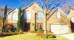 Grapevine Texas residential home that received a double car steel garage door installed and repaired by Adan Vega from Action Garage Doors