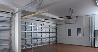 A beautiful two car steel garage door that was installed by Action Garage Doors of Crowley Texas. They are experts at repairing, servicing and maintaining steel, wood, and aluminum garage doors