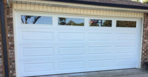 A beautiful white residential garage door