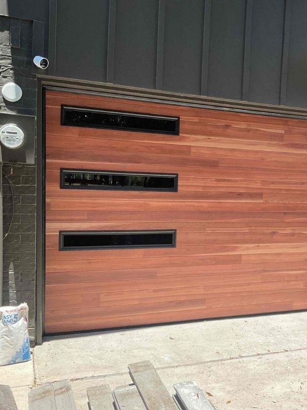 A beautiful new wood garage door. 